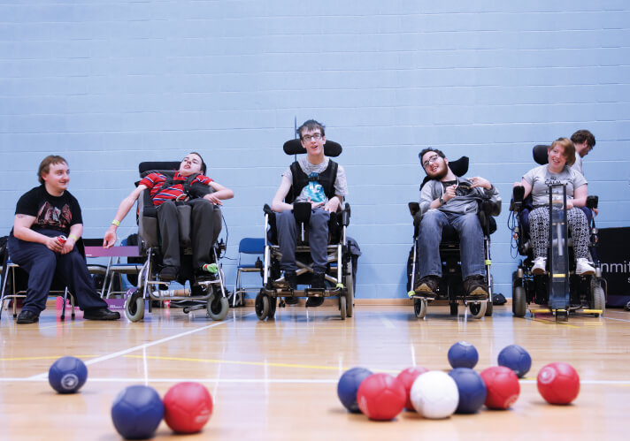 Boccia players contesting a match